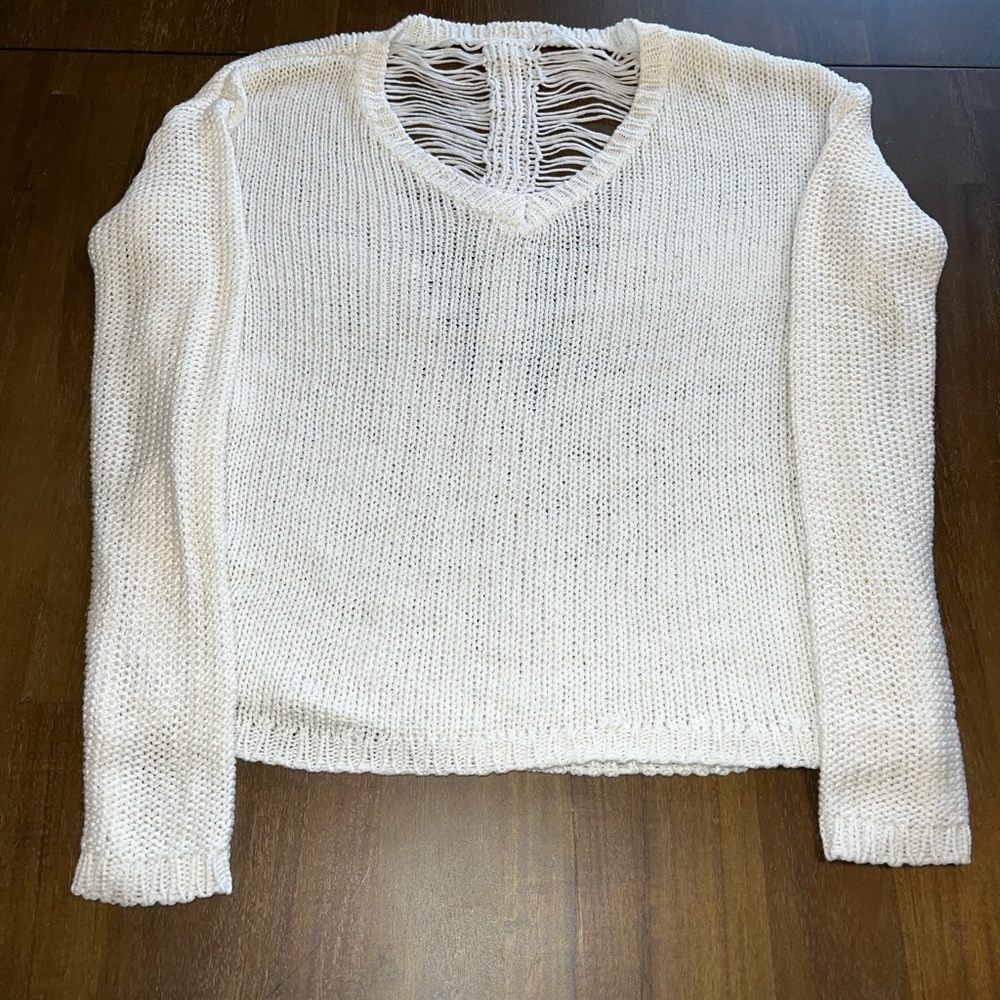 Thin white sweater